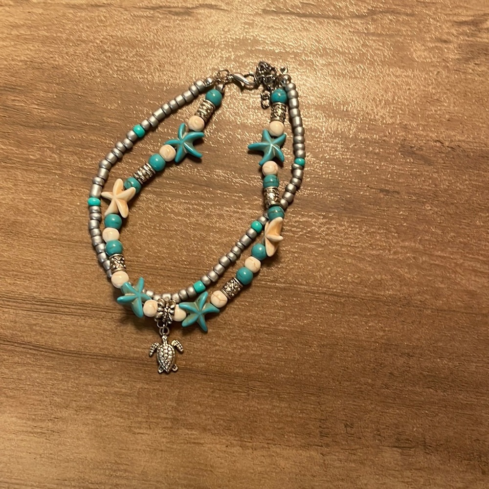 blue and white turtle ankle